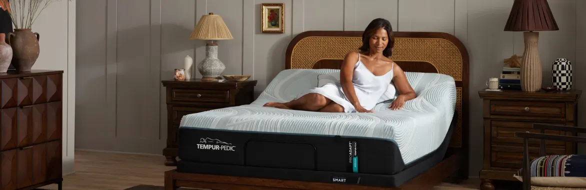 tempur-pedic-woman-laying-on-mattress-hero